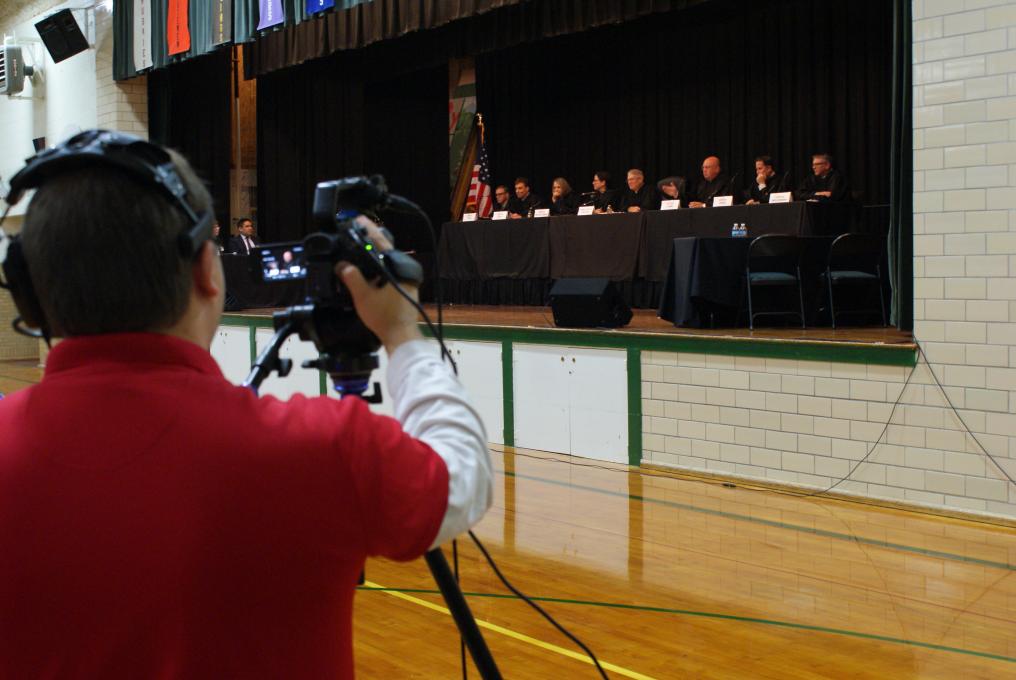 The judges are filmed during Argument Sessions at Schuyler Central High School.